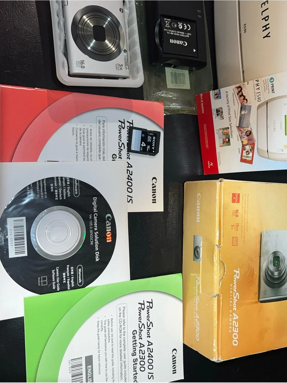CanonPowerShot& SELPHY White Portable Photo Printer with Accessories and Manuals
